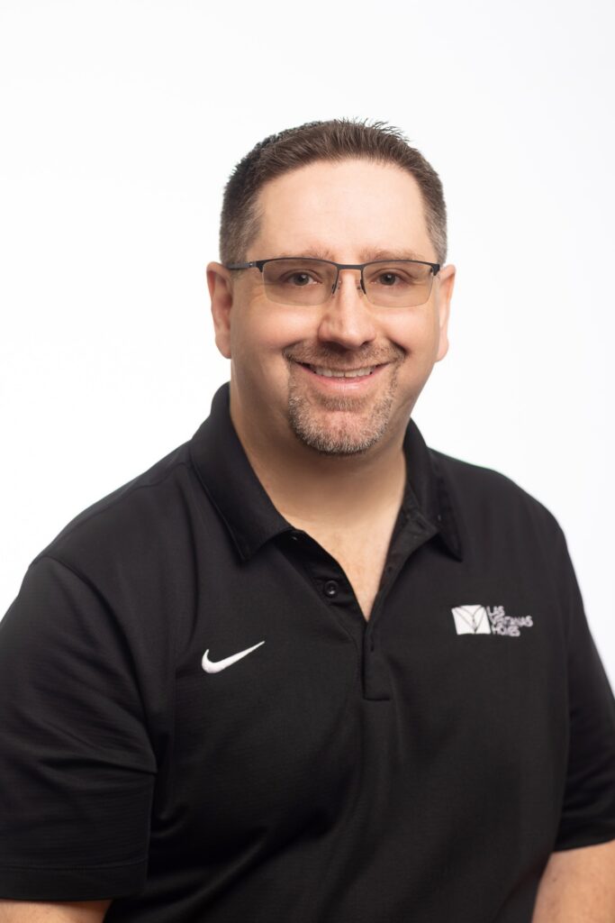 Headshot image of Andy Woolf